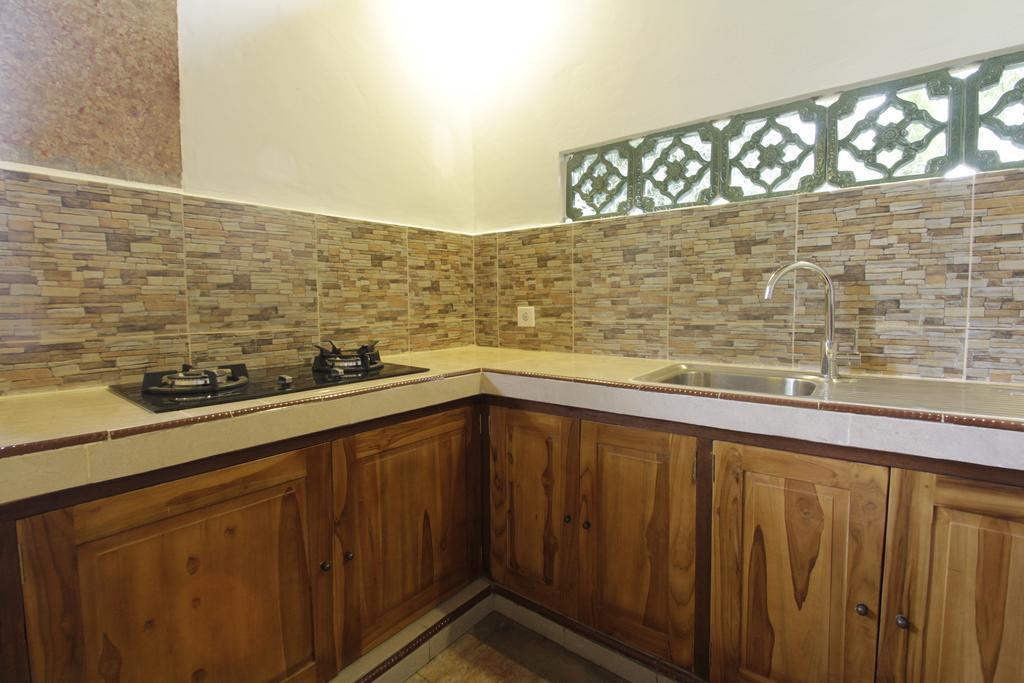 Pekak Mangku Guest House أوبود الغرفة الصورة